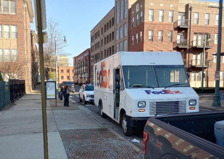 A FedEx truck was being closely followed by a security company van as it made deliveries in Downtown Memphis recently. (Joe Smith, WREG)
