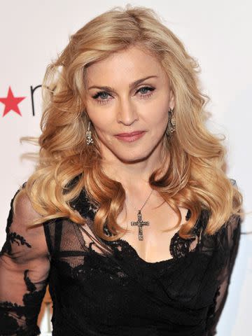 <p>Stephen Lovekin/Getty</p> Madonna Launches Her Signature Fragrance "Truth Or Dare" By Madonna at Macy's Herald Square on April 12, 2012 in New York City.