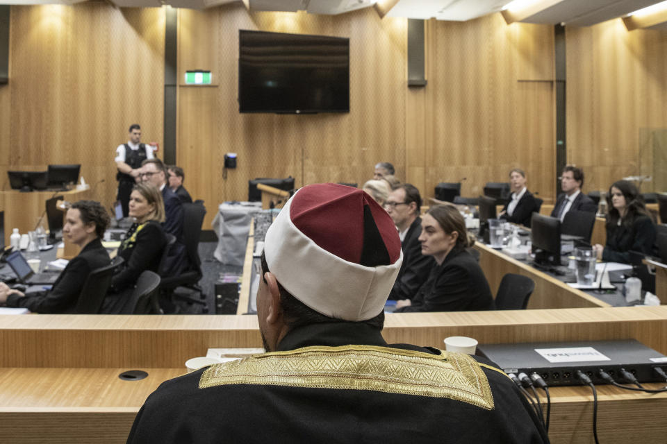 Al Noor Mosque Imam Gamal Fouda looks onto the court room during a coroner's inquiry in Christchurch, New Zealand, Tuesday, Oct. 24, 2023, into the 2019 mosque shootings. The inquiry into New Zealand’s worst mass-shooting will examine, among other issues, the response times of police and medics and whether any of the 51 people who were killed could have been saved. (Iain McGregor/Pool Photo via AP)