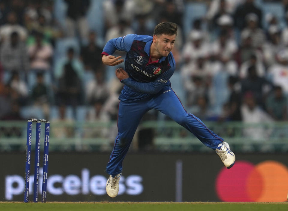 Afghanistan's Noor Ahmad bowls a delivery during the ICC Men's Cricket World Cup match between Afghanistan and Netherlands in Lucknow, India, Friday, Nov. 3, 2023. (AP Photo/Altaf Qadri)