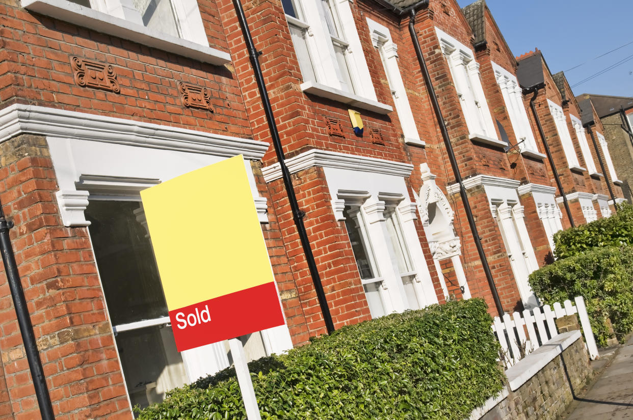 Typical English home with a "SOLD" sign.CLICK HERE FOR MORE SIMILAR IMAGES