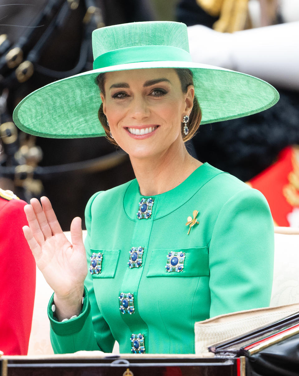 Kate Middleton in green dress and hat and sapphire and diamond earrings at Trooping the Colour