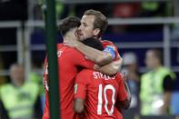 <p>John Stones and Raheem Sterling are the first to congratulate Kane on sixth goal of the World Cup </p>