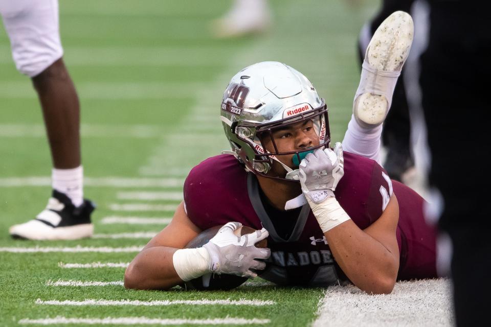 Alcoa's Eli Owens (44) poses after completing the pass and making the first down on a fake punt during the TSSAA BlueCross Bowl Division I-AAA championship game at Finley Stadium in Chattanooga, Tenn. on Friday, Dec. 1, 2023.