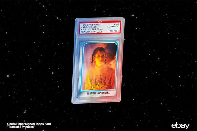 <p>Courtesy of eBay</p> 1980 Topps Tears of a Princess trading card signed by Carrie Fisher