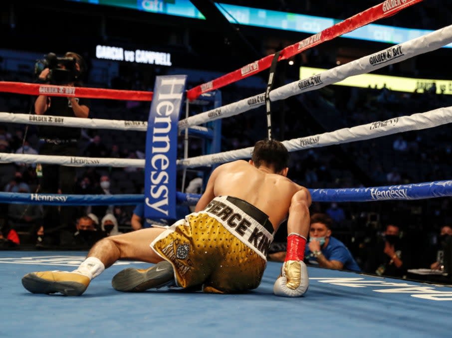 <p>Ryan Garcia is knocked to the canvas in the second round</p>Getty Images