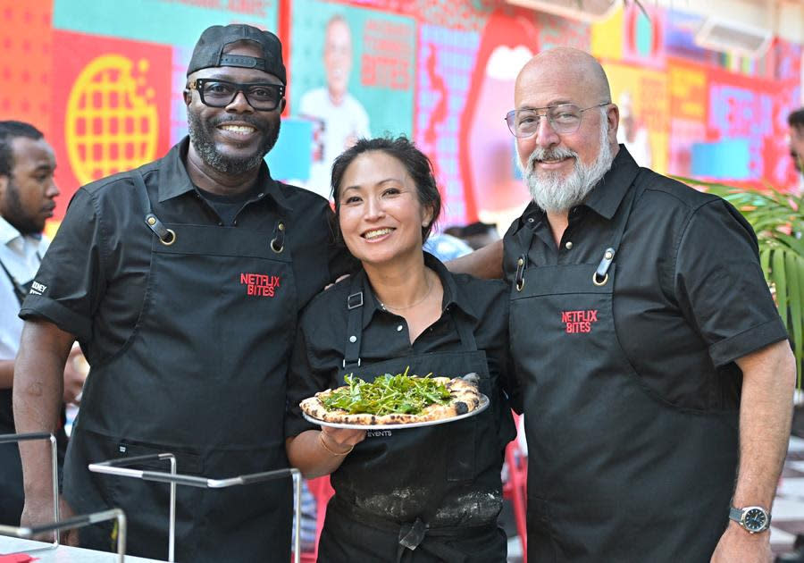 (Left to Right) Chefs Rodney Scott, Ann Kim and Andrew Zimmern all cooked for the Netflix Bites restaurant pop-up’s opening night at Short Stories Hotel in Los Angeles. (Charley Gallay/Getty Images for Netflix)