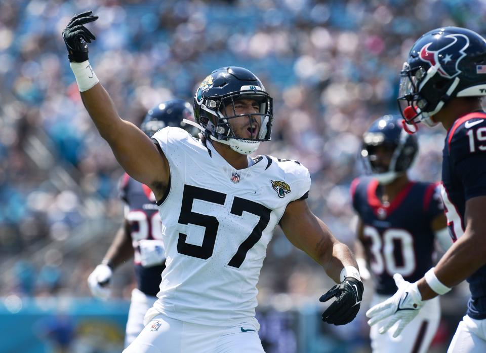 Jacksonville Jaguars linebacker Caleb Johnson (57) celebrates a tackle on the opening kickoff of Sunday’s game. The Jacksonville Jaguars hosted the <a class="link " href="https://sports.yahoo.com/nfl/teams/houston/" data-i13n="sec:content-canvas;subsec:anchor_text;elm:context_link" data-ylk="slk:Houston Texans;sec:content-canvas;subsec:anchor_text;elm:context_link;itc:0">Houston Texans</a> at EverBank Stadium in Jacksonville, Fla. Sunday, September 24, 2023. The Jaguars trailed 17 to 0 at the end of the first half. [Bob Self/Florida Times-Union]