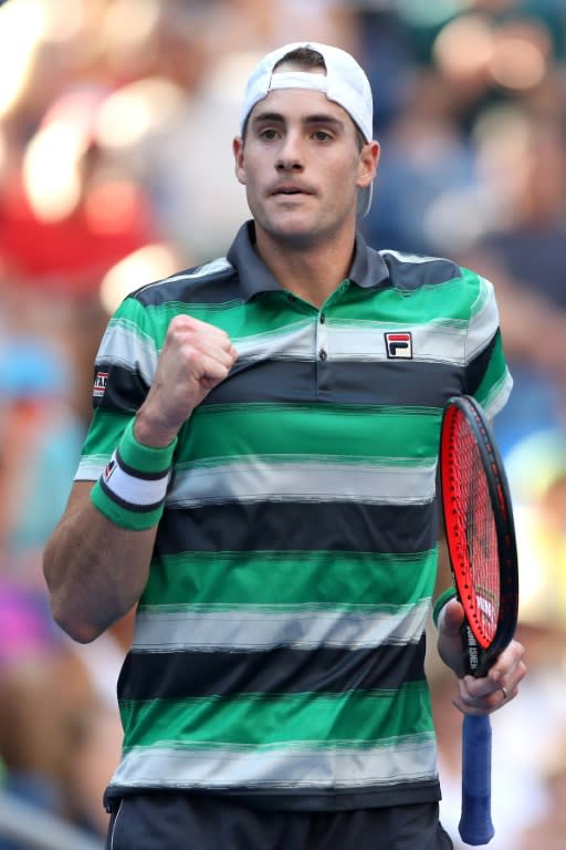 King of the jungle: John Isner on his way to victory over Milos Raonic