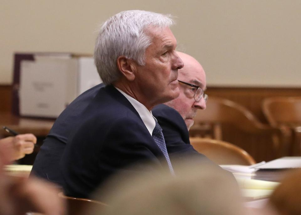 James Krauseneck Jr., right, with his defense attorney William Easton, listens to his defense co-counsel Michael Wolford give their opening statement as his murder trial begins at the Hall of Justice in Rochester Tuesday, Sept. 6, 2022.