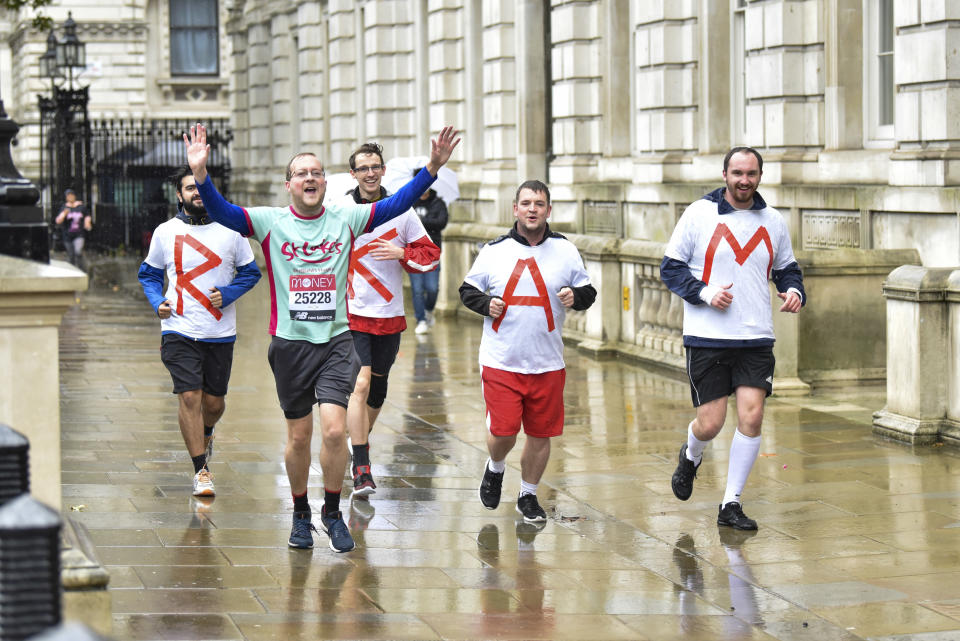 Mark Smith 25228 seen running past Downing Street, London taking part in the Virgin Money Virtual London Marathon running for the St Lukes Hospice. (Photo by Dave Rushen / SOPA Images/Sipa USA)