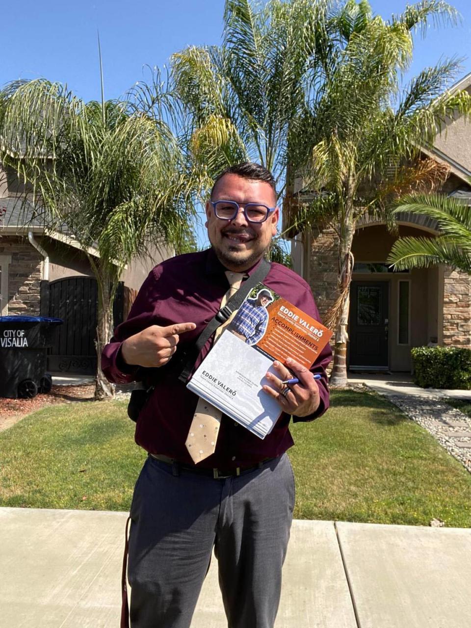 In-between meetings, Tulare County Supervisor Eddie Valero uses his breaks to walk and do some canvassing in the neighborhood