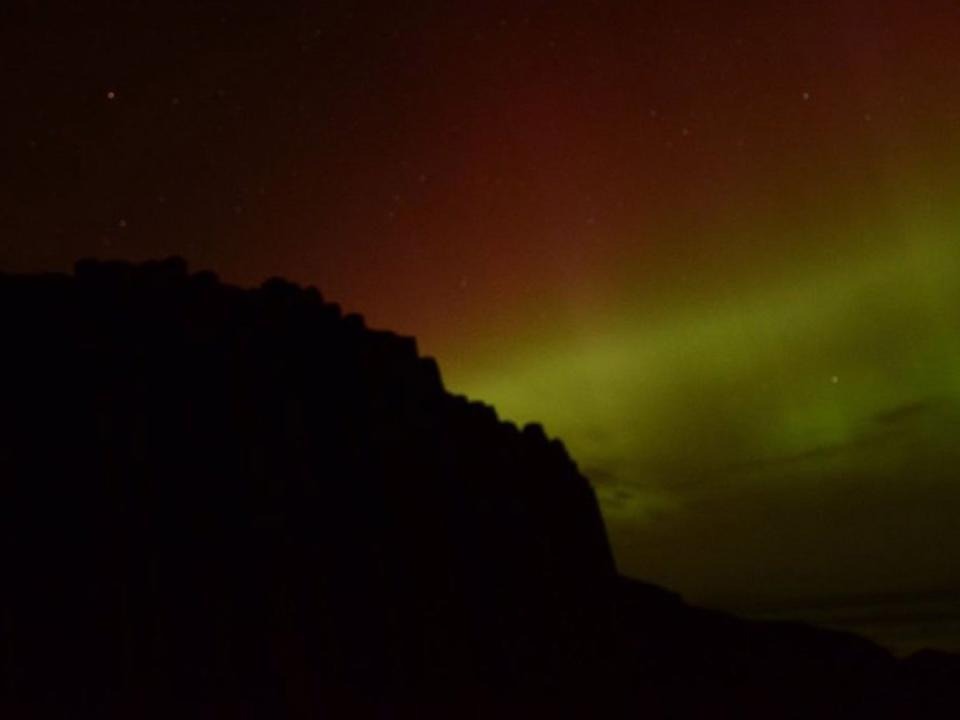 The beautiful skies could be spotted across the sea in Giant's Causeway, Northern Ireland (Caroline Burgess/Twitter)