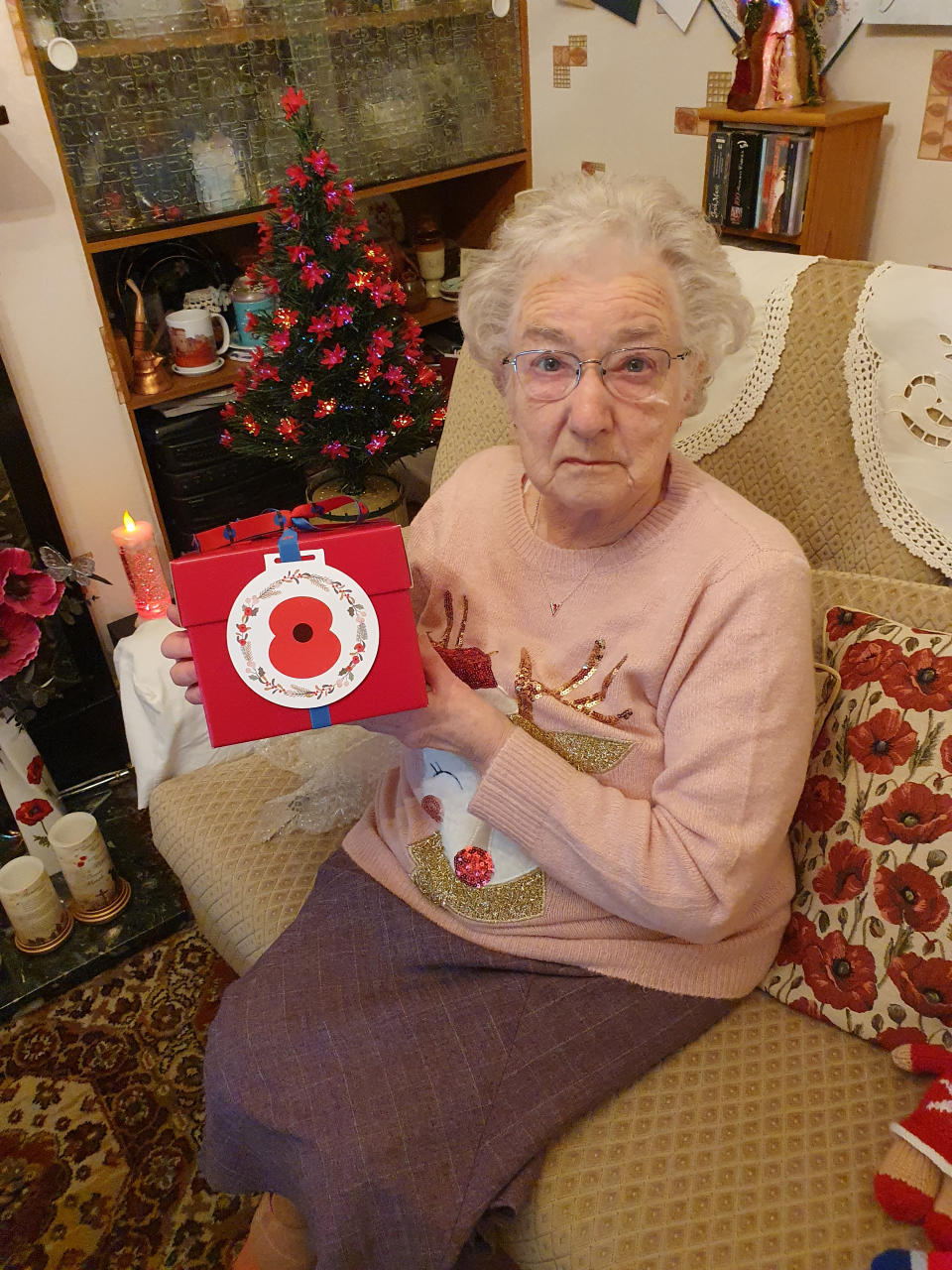 EMBARGOED TO 2200 MONDAY DECEMBER 21 Undated handout photo issued by the Royal British Legion of Vera Parnaby, 81, from Consett, County Durham, who has been a Royal British Legion volunteer for 75 years collecting in excess of £1 million for the Poppy Appeal. Vera was a recipient of a Royal British Legion 'Together at Christmas' gift box containing one of the Christmas puddings made by members of the royal family at Buckingham Palace in 2019. The Royal British Legion has gifted 99 Christmas puddings mixed by four generations of the Royal Family to members of the Armed Forces community across the UK and overseas as part of its 'Together at Christmas' initiative.