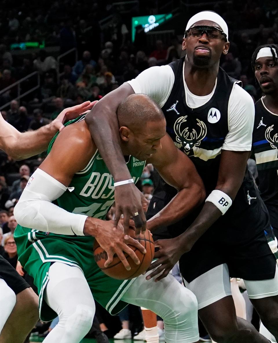 Milwaukee Bucks center Bobby Portis fouls Boston Celtics center Al Horford during Game 2 of an Eastern Conference semifinal in Boston.