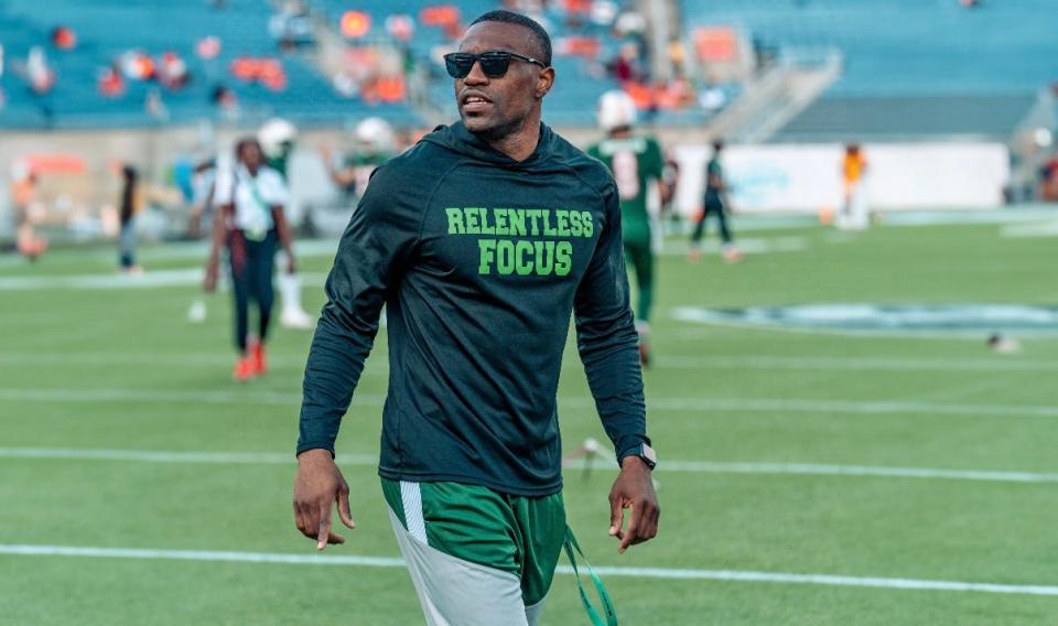 Florida A&M running backs coach Marcus Windham looks on as the Rattlers prepare to play against the Bethune-Cookman Wildcats in the Florida Classic at Camping World Stadium in Orlando, Florida, Saturday, November 18, 2023.