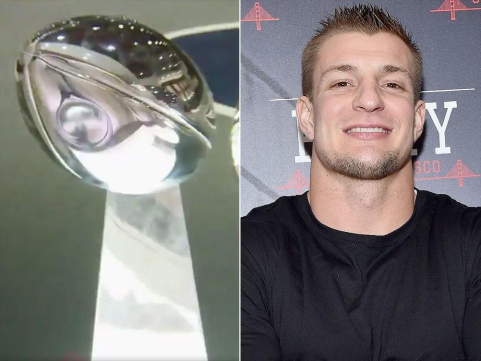 Rob Gronkowski's shows a big smile that is almost as large as the dent he left in the Super Bowl trophy | New England Patriots;