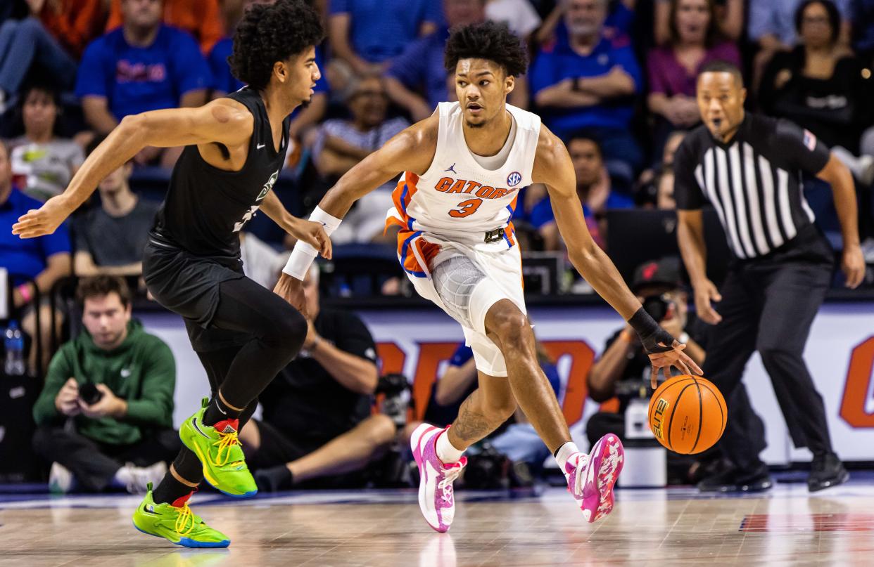 Florida forward Alex Fudge drives down the floor against Stetson during Sunday's game in Gainesville.