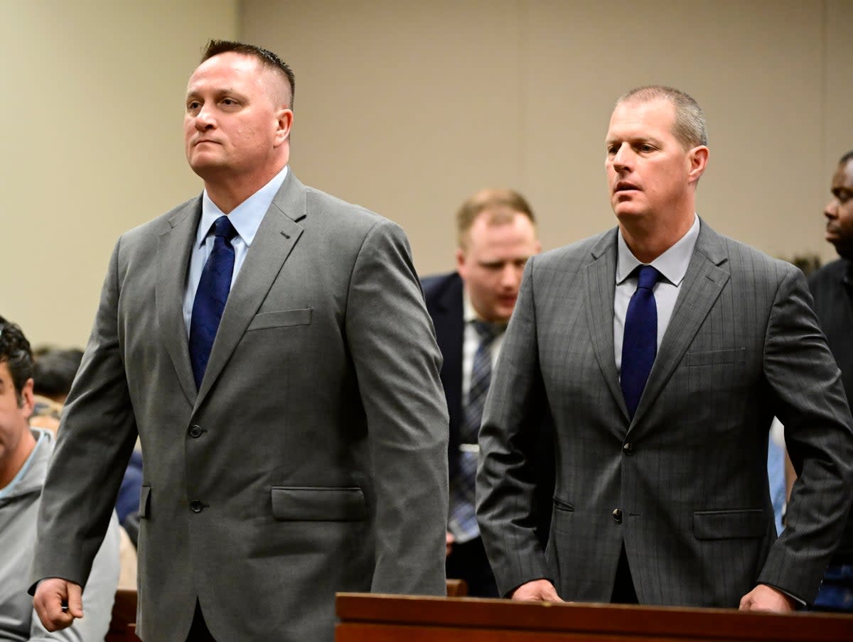 Paramedics Jeremy Cooper, left, and Peter Cichuniec attend an arraignment at the Adams County Justice Center in Brighton, Colorado in January 2023 (2023 The Denver Post, Medianews Group)