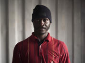 Eclador Ngatcho, 40, from Cameroon, pose for a portrait aboard the humanitarian rescue ship Ocean Viking, in Italian waters off the Sicilian town of Messina, southern Italy, Monday, Sept. 23, 2019, hours before disembarking. Ngatcho used to work as a delivery driver in his home country of Cameroon where his two daughters (one of whom was born after he left) still live with their mother. He left to find a better job to support his growing family and ended up in Libya where he was sent to a detention center. He was beaten when he couldn’t afford to pay the ransom the prison guards asked from him and was forced to work as a cook. He eventually escaped. (AP Photo/Renata Brito)