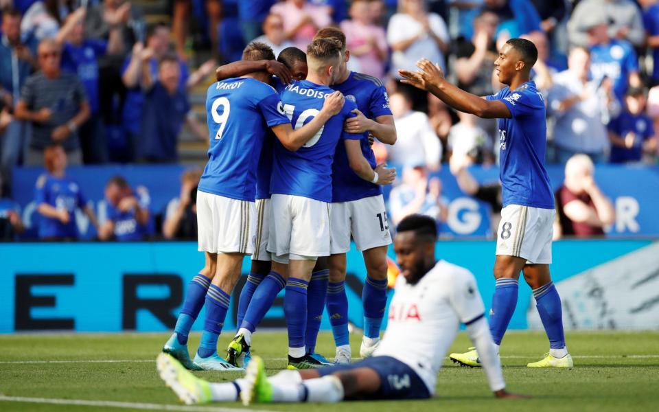 Leicester City's Ricardo Pereira celebrates scoring their first goal with team mates as Tottenham Hotspur's Danny Rose  - Action Images via Reuters