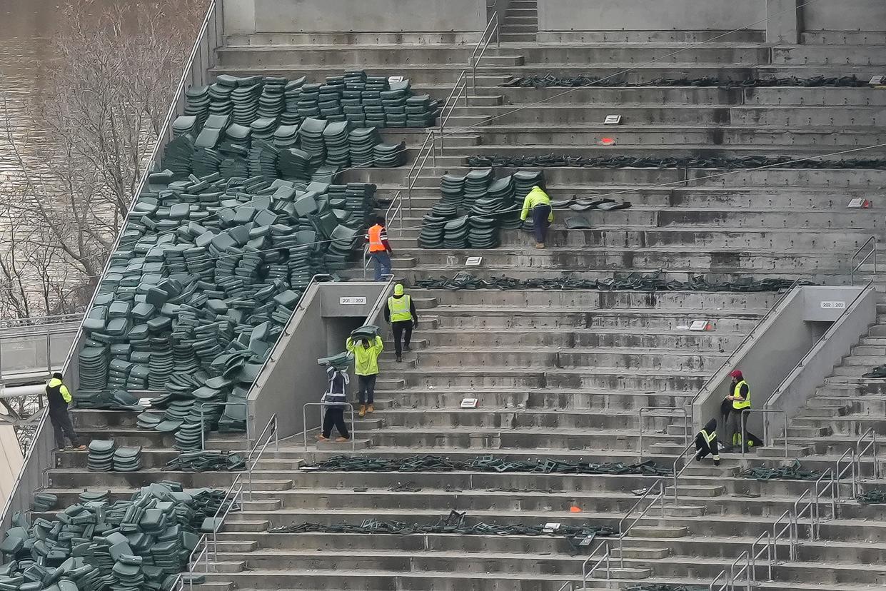 Stadium seats are removed by workers on Wednesday, Feb. 7, 2024, at Paycor Stadium in Downtown Cincinnati.