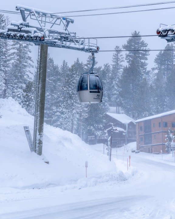 A Mammoth Mountain lift is seen in this photo from Mammoth Lakes Tourism. The mountain saw more than ten feet of snow in February as of Feb. 20, 2024. (Jacob Myhre, Mammoth Lakes Tourism)