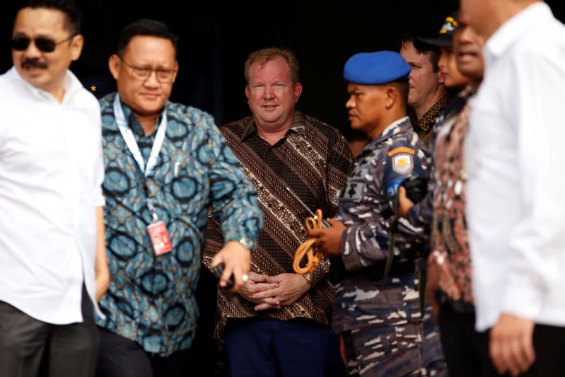 CEO of Boeing Commercial Airplanes Stan Deal stands as he attends one-year commemoration of the Lion Air JT-610 which crashed at Java sea, in Jakarta
