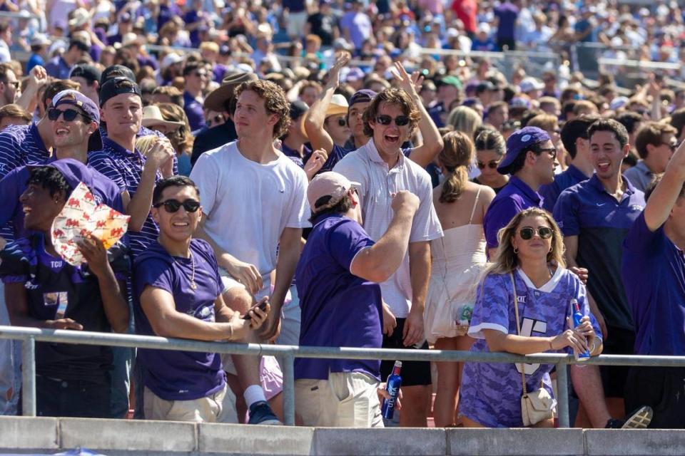 TCU fans react after the third touchdown during their rivalry game against SMU on Saturday, Sept. 24, 2022, at the Gerald Ford Stadium in the Southern Methodist University in Dallas, Texas.