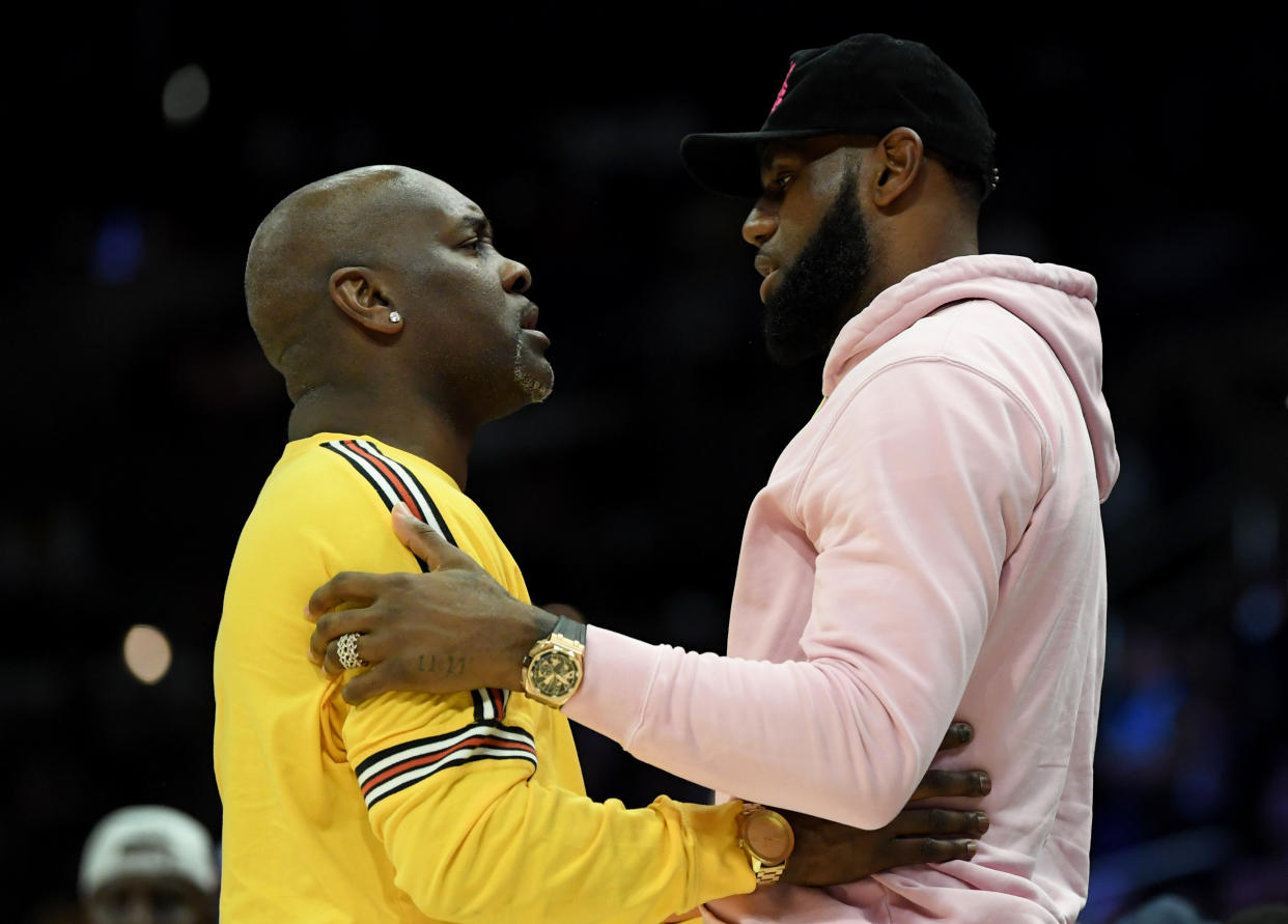 LOS ANGELES, CALIFORNIA - SEPTEMBER 01: LeBron James greets head coach Gary Payton of the 3 Headed Monsters after the game during the BIG3 Championship at Staples Center on September 01, 2019 in Los Angeles, California. (Photo by Harry How/BIG3 via Getty Images)