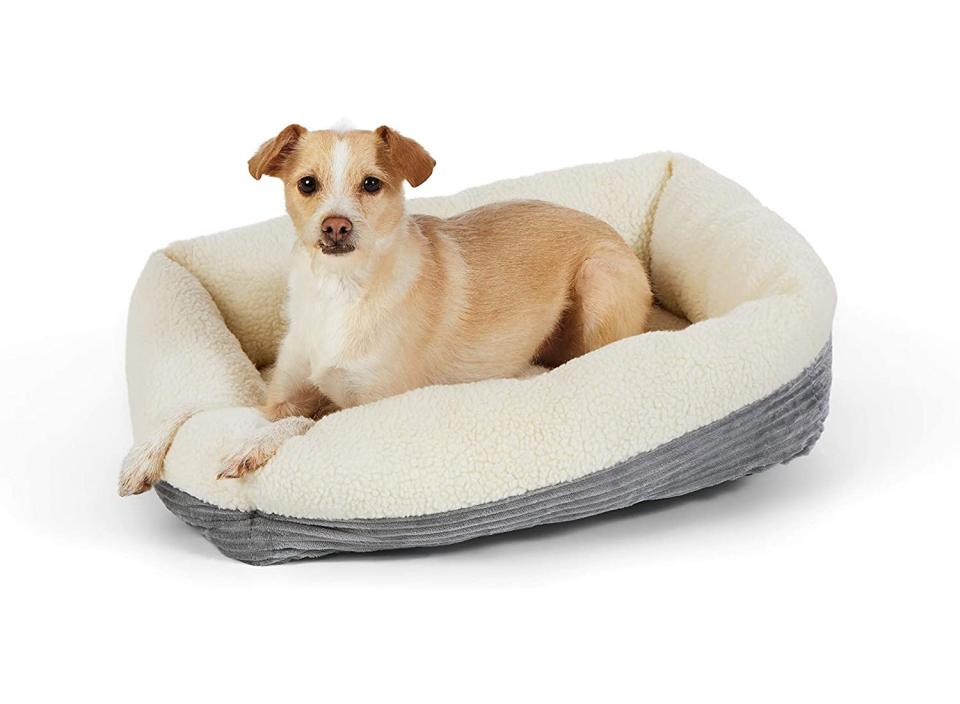 This pet bed is built with similar technology to space blankets for ultimate coziness. (Source: Amazon)