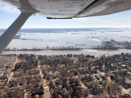 The Kansas side of the Missouri River is seen in Atchison, Kansas, U.S., March 22, 2019 in this picture obtained from social media. SHAWN RIZZA/via REUTERS