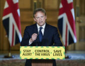 In this photo issued by 10 Downing Street, Britain's Secretary of State for Transport Grant Schapps talks during a coronavirus media briefing in Downing Street, London, Saturday, May 23, 2020. (Andrew Parsons/10 Downing Street via AP)