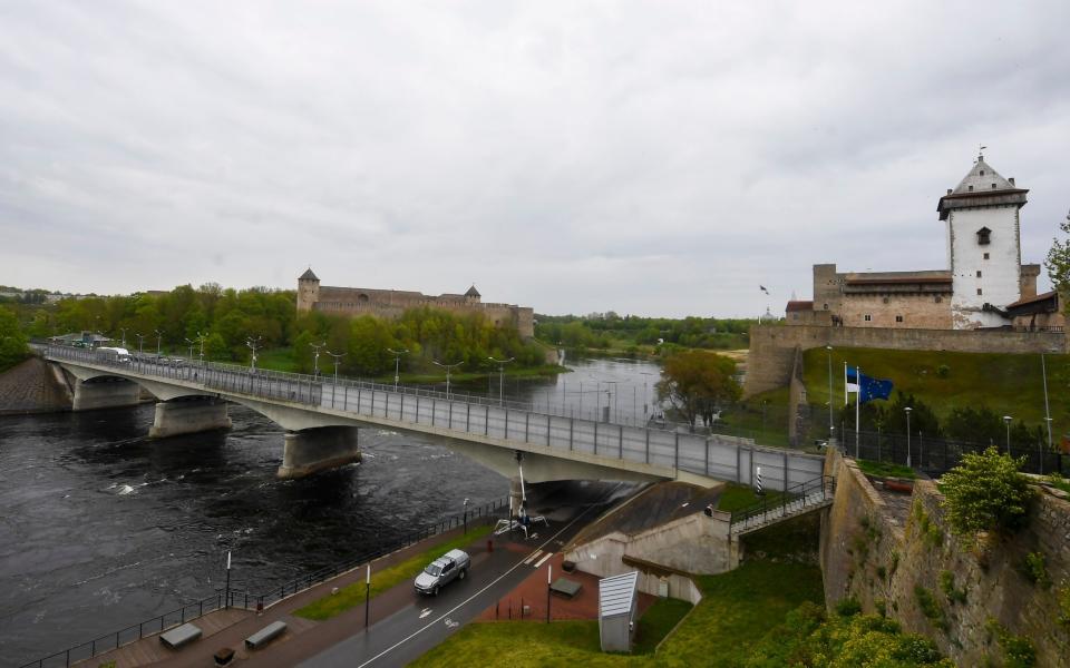 The border bridge between Estonia and Russia in Narva where two medieval fortresses sit opposite each other - Sergei Stepanov for The Telegraph