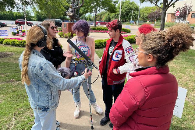 <p>Mike Hixenbaugh</p> Antonia Hylton speaks with teens in Grapevine, Texas, during her investigation into the town's anti-trans movement