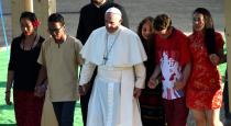 Pope Francis © with young people crosses the Gate of Mercy at the Campus Misericordiae in Brzegi, Poland, 30 July 2016, during the evening vigil with pilgrims participating in the World Youth Day 2016. (EPA/DANIEL DAL ZENNARO)