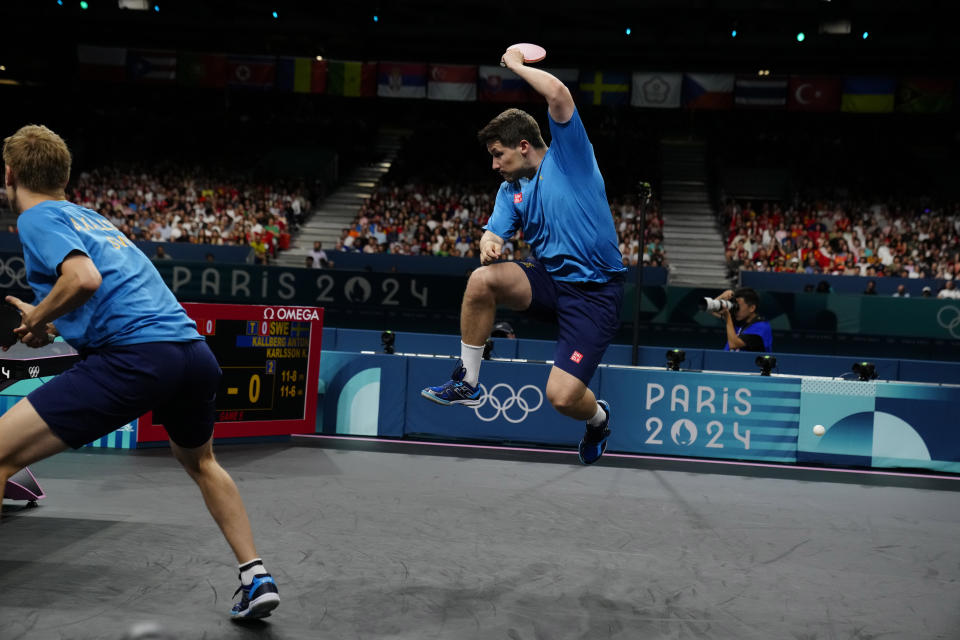 Table tennis player Ma Long makes history for China at Paris Games with