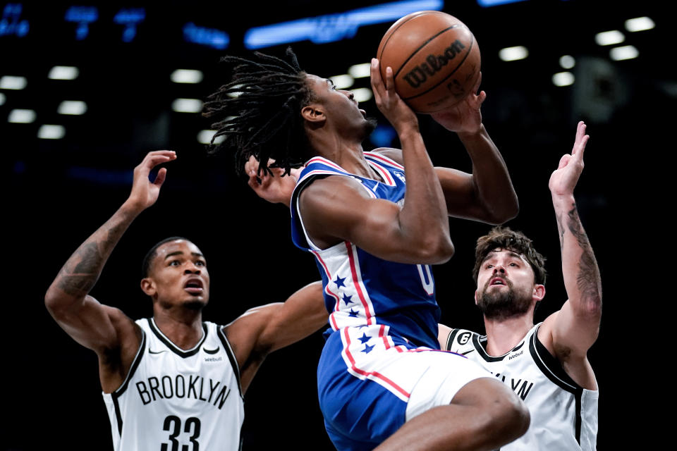 Brooklyn Nets forward RaiQuan Gray, center, attempts a layup during the first half of a preseason NBA basketball game against the Brooklyn Nets, Monday, Oct. 3, 2022, in New York. (AP Photo/Julia Nikhinson)