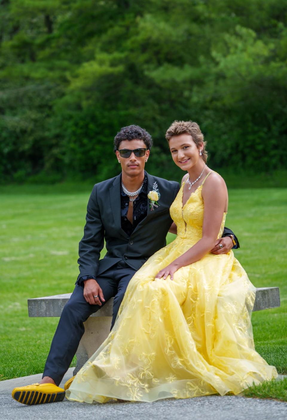 Cade Thompson and Vivian Eagle pose Saturday, May 13, 2023, for prom pictures at Friendship Gardens Park in Plainfield, ahead of Avon's prom.