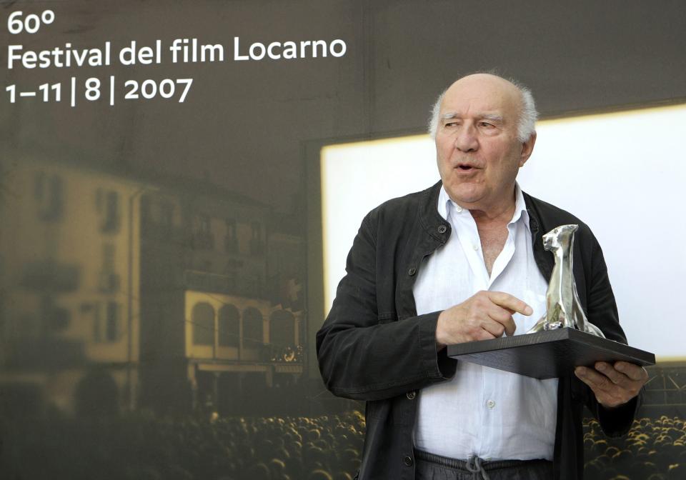 FILE --- French actor Michel Piccoli poses with the Leopard for best actor, he received in ex-aequo for his role in Hiner Saleem's film "Sous les toits de Paris", at the 60th International Film Festival Locarno, Saturday, August 11, 2007, in Locarno, Switzerland. Piccoli, aged 94, died May 12, 2020, according to AFP. (Martial Trezzini/Keystone via AP)