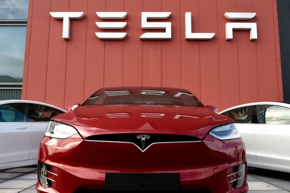 Tesla is one of the Baillie Gifford US Growth Trust’s biggest holdings (AFP via Getty Images)