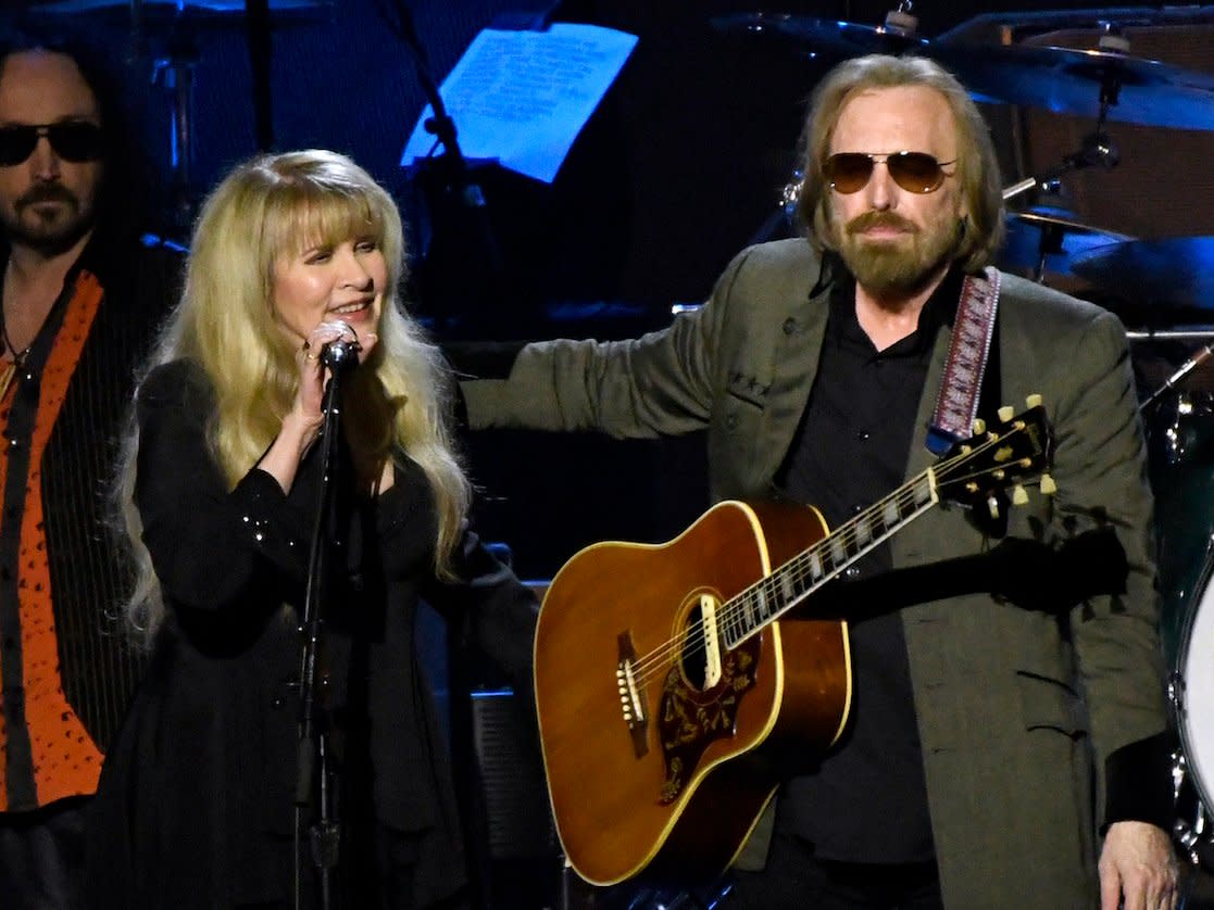 Stevie Nicks, left, and honoree Tom Petty perform at the MusiCares Person of the Year tribute at the Los Angeles Convention Center on Friday, Feb. 10, 2017.