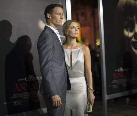 Cast members Ward Horton and Annabelle Wallis pose at the premiere of "Annabelle" at the TCL Chinese theatre in Hollywood, California September 29, 2014. REUTERS/Mario Anzuoni