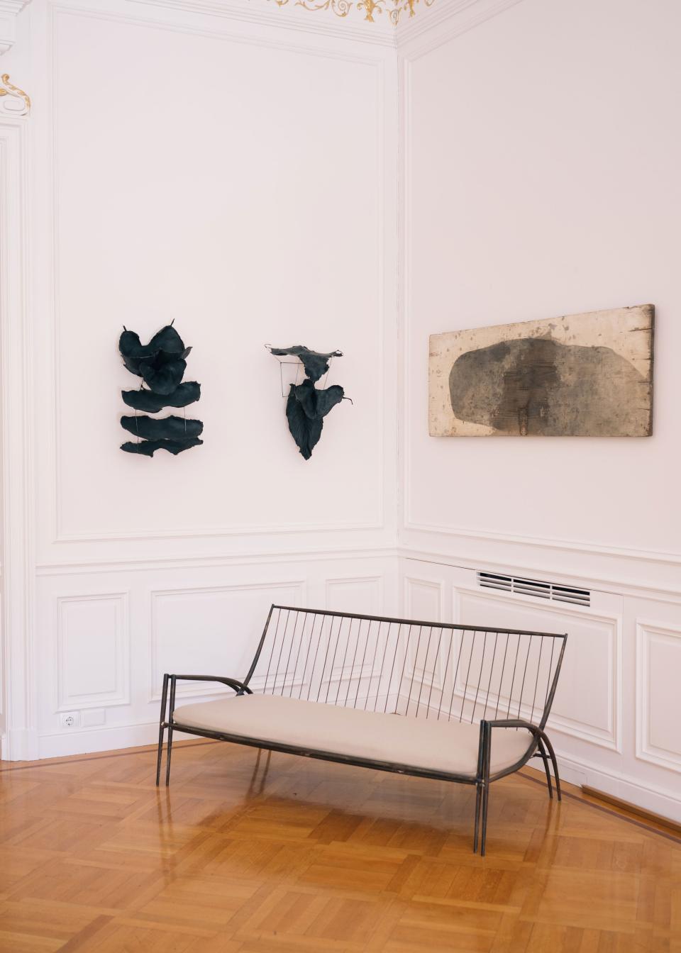 Another view of the living room, with works by Pantelis Chandris, Rena Papaspyrou, and Philolaos Tloupas.