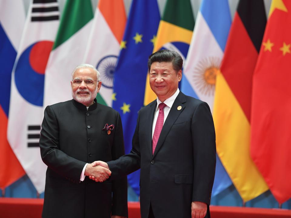 File. India’s prime minister Narendra Modi shakes hands with China’s president Xi Jinping (R) before the G20 leaders’ family photo in Hangzhou in 2016 (AFP via Getty Images)