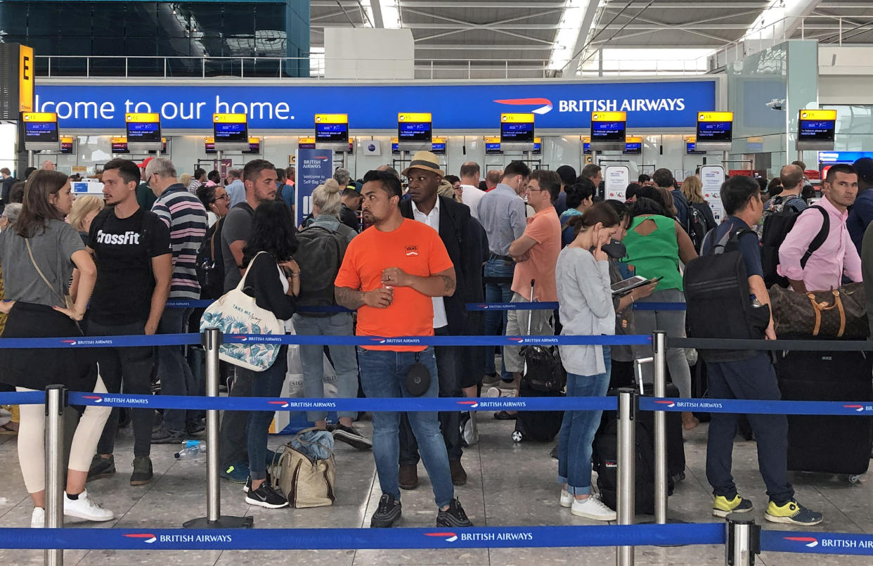 Queues in Terminal 5 at Heathrow airport as the UK's biggest airport has apologised after extreme weather conditions across Europe caused flight cancellations and delays. (Photo by Steve Parsons/PA Images via Getty Images)