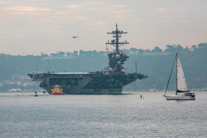 The USS Theodore Roosevelt leaves San Diego Harbor for deployment on Monday, Dec. 7, 2020 in San Diego, CA.