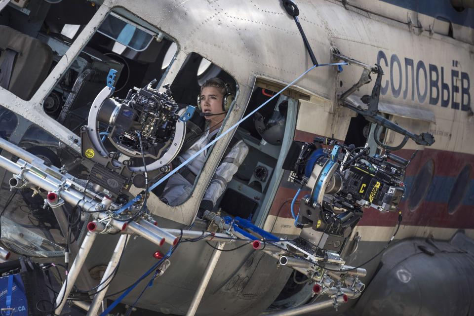 Florence Pugh inside of a fake plane