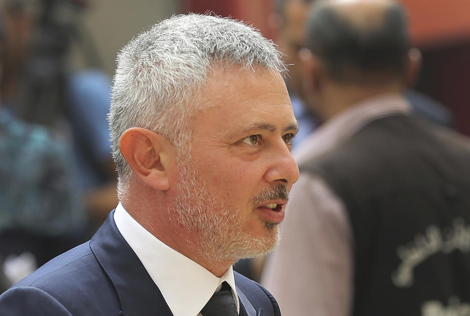 In this Sept. 9, 2015 photo, lawmaker Sleiman Frangieh prepares to enter the parliament building for the National Dialogue meeting between Lebanese political leaders, in downtown Beirut. Lebanon has been without a president for over a month, its legislators unable to agree on a new head of state. While Hezbollah has yet to publicly name a candidate, public perception is that the group backs Frangieh, a close ally of the party and of Syrian President Bashar Assad. (AP Photo/Hussein Malla)