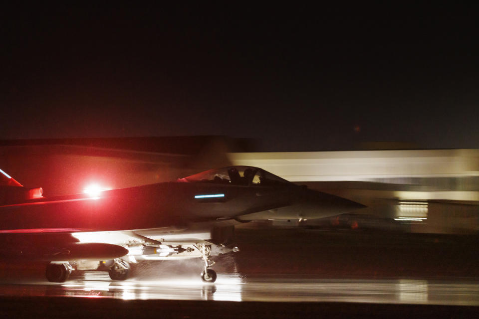 In this image provided by the UK Ministry of Defence, a Royal Air Force Typhoon FGR4 takes off to carry out air strikes against Houthi military targets in Yemen, from RAF Akrotiri, Cyprus, Monday, Jan. 22, 2024. The U.S. and British militaries bombed eight locations used by the Iranian-backed Houthis in Yemen on Monday night, the second time the two allies have conducted coordinated retaliatory strikes on an array of the rebels' missile-launching capabilities. (AS1 Jake Green RAF/Ministry of Defence via AP)